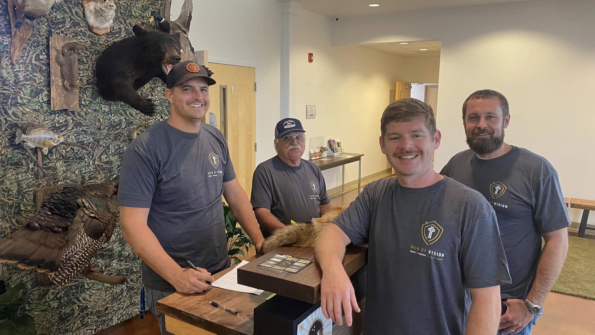 Men of Vision guys working the check-in table